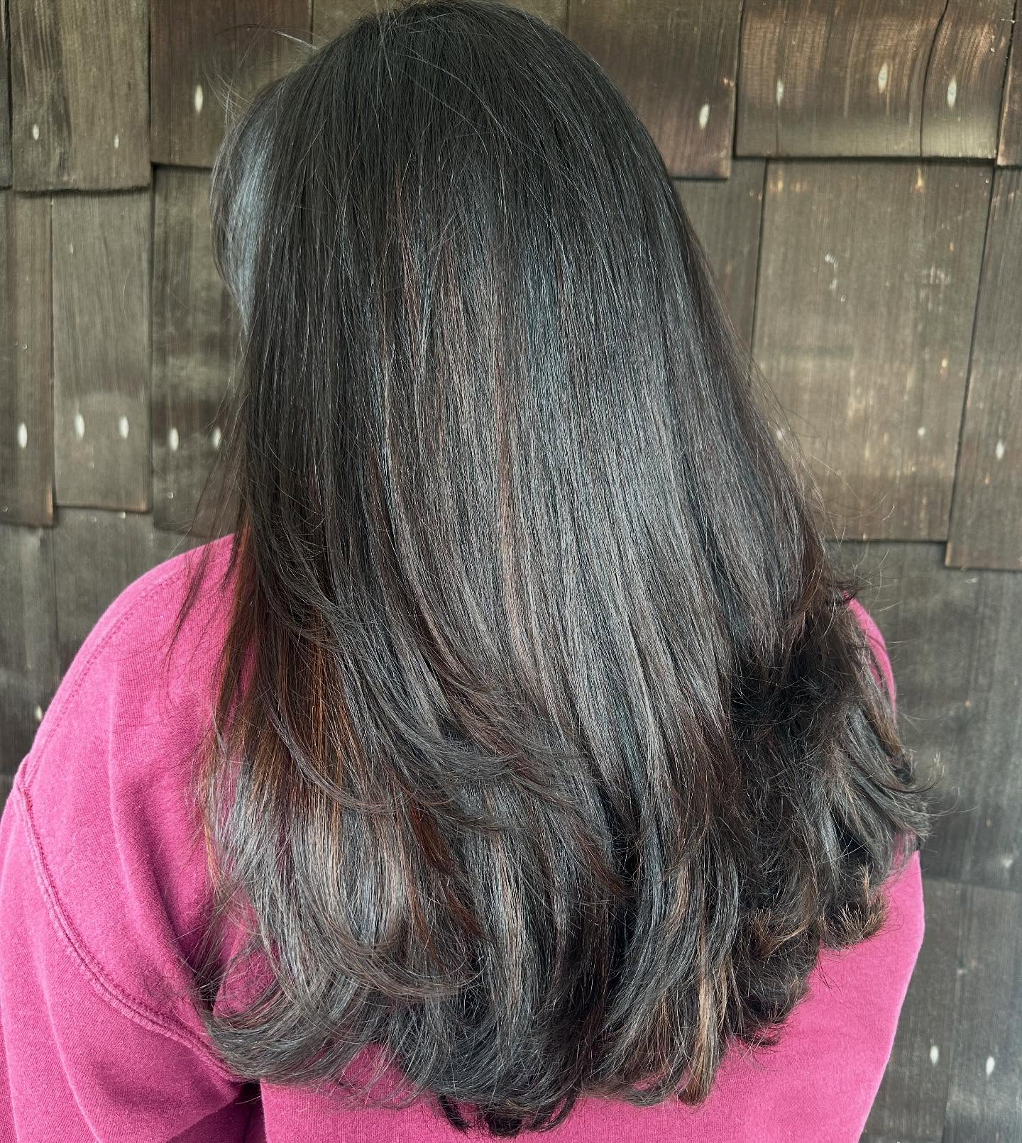 Stylist applying Bedminster balayage at a top Somerset County salon, creating on-trend hair color and professional hairstyles with dimensional shine.