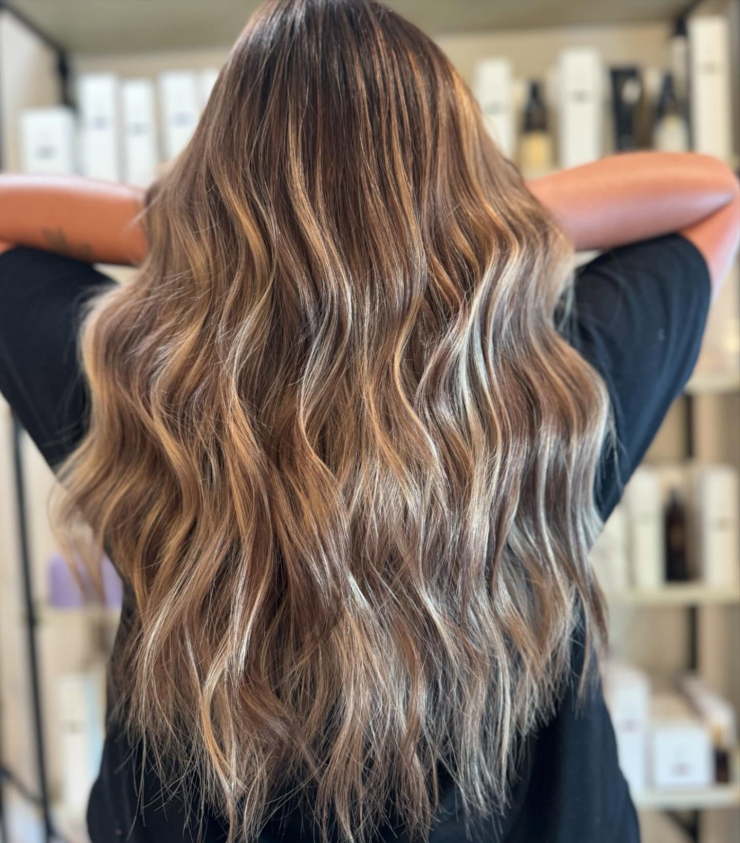 Client receiving expert Bedminster color correction at Beautique Hair Design, where professional colorists specialize in hair color repair and salon color fix.