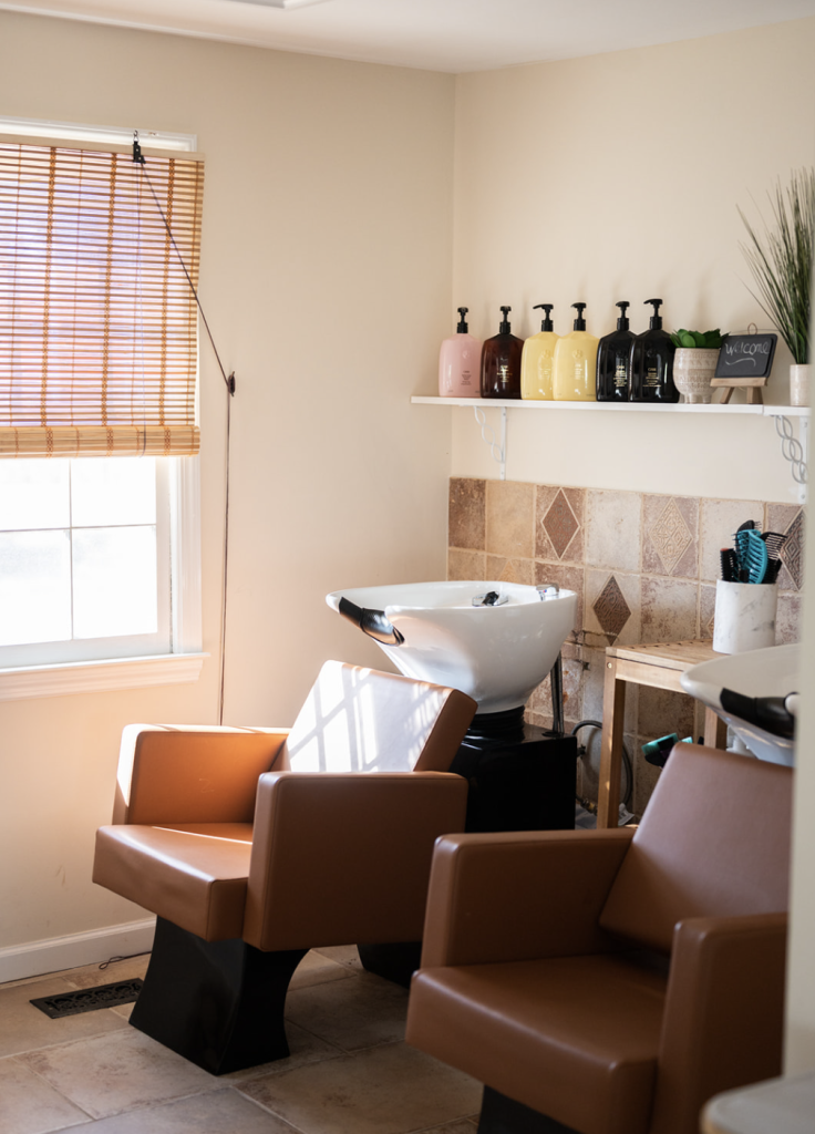 Stylist applying Bedminster balayage at a top Somerset County salon, creating on-trend hair color and professional hairstyles with dimensional shine.