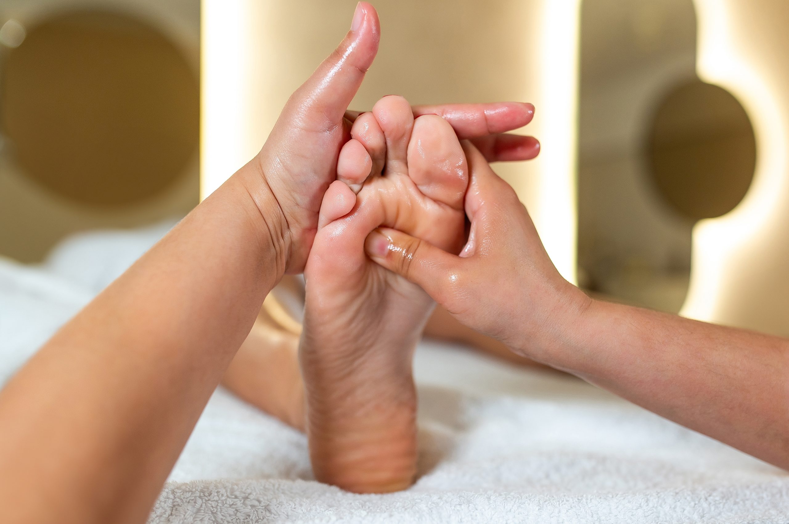 Guest experiencing Bedminster alternative healing through reflexology and energy work at a holistic spa offering wellness-focused services and benefits.